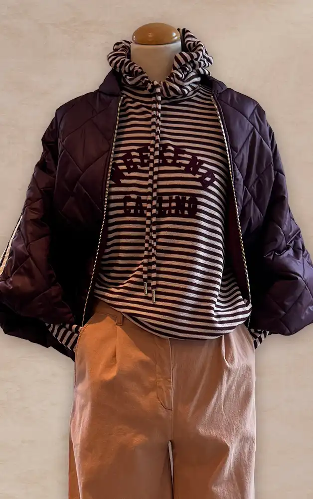 Damenmode - Kombination von T-Shirt und Hose in Orange aus der aktuellen Herbst-/Winterkollektion 2027