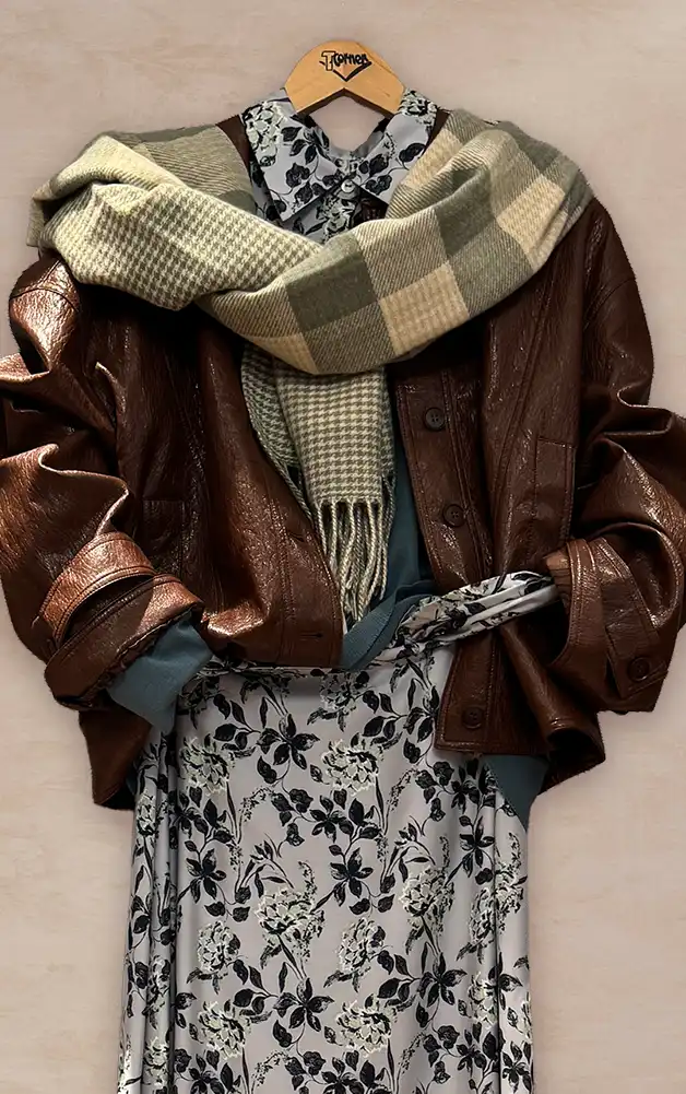 Damenmode - Kombination aus Jacke, Bluse und Hose aus der aktuellen Herbst-/Winterkollektion 2027